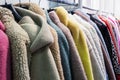 Faux fur coats on a hanger in the store Royalty Free Stock Photo