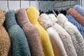 Faux fur coats on a hanger in the store Royalty Free Stock Photo