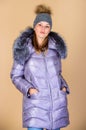 Faux fur. Fashion girl winter clothes. Fashion coat and hat. Fashion trend. Warming up. Casual winter jacket slightly Royalty Free Stock Photo