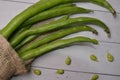 Fave beans legumes on wooden table Royalty Free Stock Photo