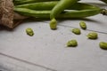 Fave beans legumes on wooden table Royalty Free Stock Photo