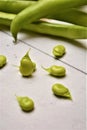 Fave beans legumes on wooden table Royalty Free Stock Photo