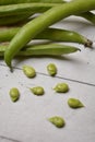 Fave beans legumes on wooden table Royalty Free Stock Photo