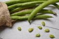 Fave beans legumes on wooden table Royalty Free Stock Photo