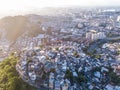 Favelas house on the hills. Aerial photo of city Rio de Janeiro Brazil. narrow streets of the poor . Beautiful sunset Royalty Free Stock Photo