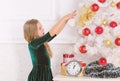 Favorite day of the year. Christmas celebration. Get incredibly excited about christmas. Kid girl christmas tree waiting Royalty Free Stock Photo