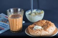 Favorite indian breakfst with tea and bun butter against black background Royalty Free Stock Photo
