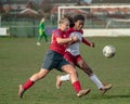 Favour Omenazu of Northampton Town Ladies battles with Alise Gindra of Wem Town Ladies