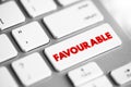 Favourable - to the advantage of someone or something, text concept button on keyboard Royalty Free Stock Photo