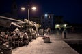 Illuminated Restaurant and Promenade With Tourists In Fazana Croatia In The Nighttime Royalty Free Stock Photo