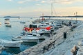 Fazana, Croatia - June 1, 2019: view of boats in dock at sunset. Royalty Free Stock Photo