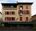 FaÃÂ§ade with red shutters French architecture in Figeac