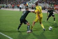 FC Kuban midfielder Vladislav Kulik surrounded by defenders Royalty Free Stock Photo