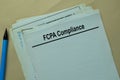 FCPA Compliance write on a paperwork isolated on office desk Royalty Free Stock Photo