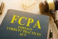 FCPA Foreign Corrupt Practices Act on a desk. Royalty Free Stock Photo
