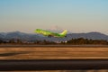 FDA Embraer ERJ-170-200 take off at dusk Royalty Free Stock Photo