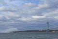 FDNY Fireboat sprays water into the air to celebrate the start of New York City Marathon 2014 in the front of Verrazano Bridge