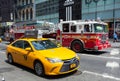 FDNY firetruck and yellow cab in Manhattan