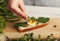 Feamale hands making healthy bruschettas for right snack Royalty Free Stock Photo