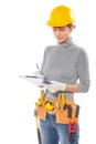 Feamale worker with construction tools holding clipboard writing Royalty Free Stock Photo