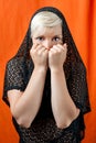 Feared girl covering her face Royalty Free Stock Photo