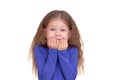 Fearful little girl holding raised fists close to mouth Royalty Free Stock Photo