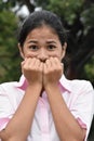 Fearful Pretty Diverse Girl Wearing Pink Shirt Headshot