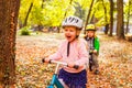 Fearless and active girl on a balance bike