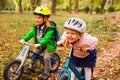 Fearless and active girl on a balance bike