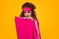 Fearless superhero kid in pink cape Royalty Free Stock Photo