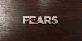 Fears - grungy wooden headline on Maple - 3D rendered royalty free stock image