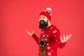 Feast day. wear christmas mood. knitwear male fashion. funny looking man. new year party. still believe in santa claus Royalty Free Stock Photo