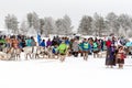 Feast of reindeer herders and fishermans. Competitors and spectators watch the reindeer races