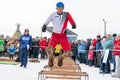 Feast of reindeer herders and fishermans. Jumping through the sleds