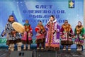 Feast of reindeer herders and fishermans. Women in national costumes of the peoples of the Far North perform a traditional song