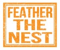 FEATHER THE NEST, text on orange grungy stamp sign Royalty Free Stock Photo