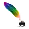 Feather pen abstract colors in the ink pot Royalty Free Stock Photo