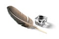 Feather pen and inkwell isolated on white Royalty Free Stock Photo