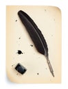 Feather quill and inkwell on an old paper Royalty Free Stock Photo