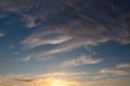 Feathery clouds in the evening sky