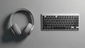 Features a wireless keyboard and a pair of over ear headphones Royalty Free Stock Photo