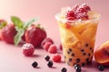 Featuring boba tea with red fruit and ice cubes in a plastic cup isolated on a pink background, in a front view. fresh bubble Royalty Free Stock Photo