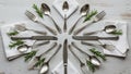 Featuring forks knives and spoons forms a circular pattern on a light Royalty Free Stock Photo