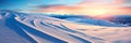 featuring fresh ski tracks on a snowy slope at sunrise, with warm oranges and cool blues blending in the sky. Royalty Free Stock Photo