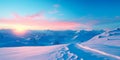 featuring fresh ski tracks on a snowy slope at sunrise, with warm oranges and cool blues blending in the sky. Royalty Free Stock Photo