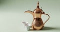 Ornate Arabic coffee pot (Dallah) made of polished brass with intricate engravings, Royalty Free Stock Photo