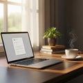 Featuring a modern laptop displaying a document, placed on a wooden Royalty Free Stock Photo