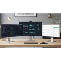 Featuring three computer monitors displaying various data and Royalty Free Stock Photo