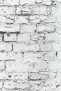 Featuring white brick wall with chipped paint texture for background or backdrop design Royalty Free Stock Photo