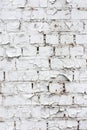 Featuring white brick wall with chipped paint texture for background or backdrop design Royalty Free Stock Photo